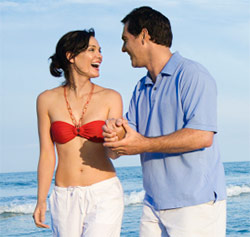 Couple walking on beach